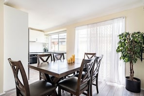 Dining - Cheerful 4 bedroom home with parking on premises (Plumpton)