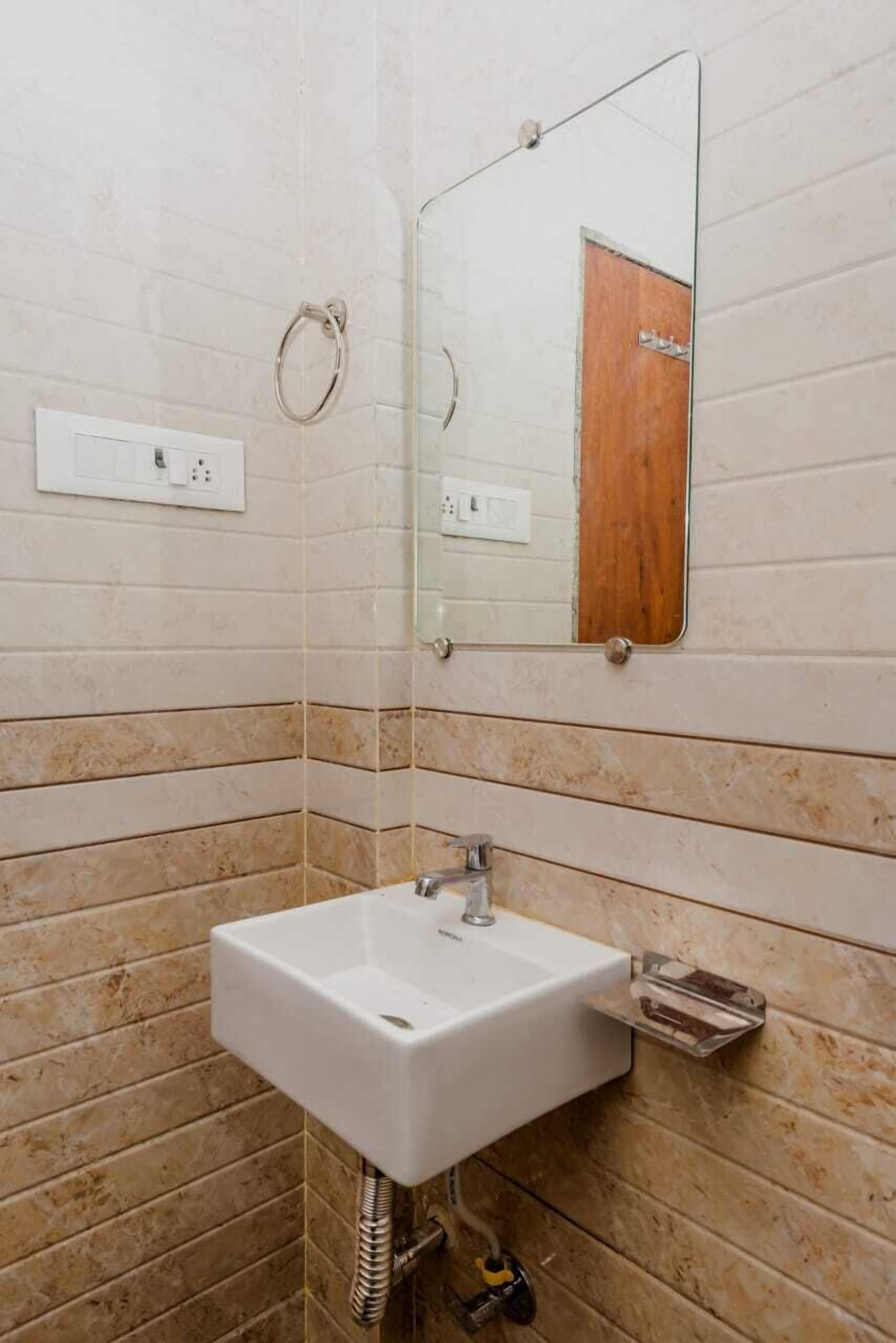 Shower, rainfall showerhead, towels, soap