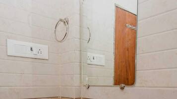 Shower, rainfall showerhead, towels, soap