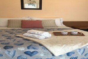 1 habitación, tabla de planchar con plancha, wifi y ropa de cama 