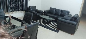 Luxury Apartment | Living area | TV - Sai Maa Resort And Convention Centre (Puttaparti)