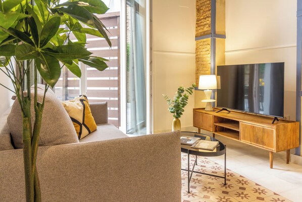 Apartment, 1 Bedroom, Terrace, Ground Floor | Living area | TV - Feelathome San Lorenzo Apartments (Seville)