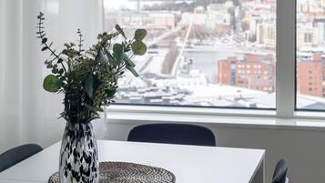 Exclusive Apartment | Living area | 40-inch flat-screen TV with cable channels, TV, heated floors