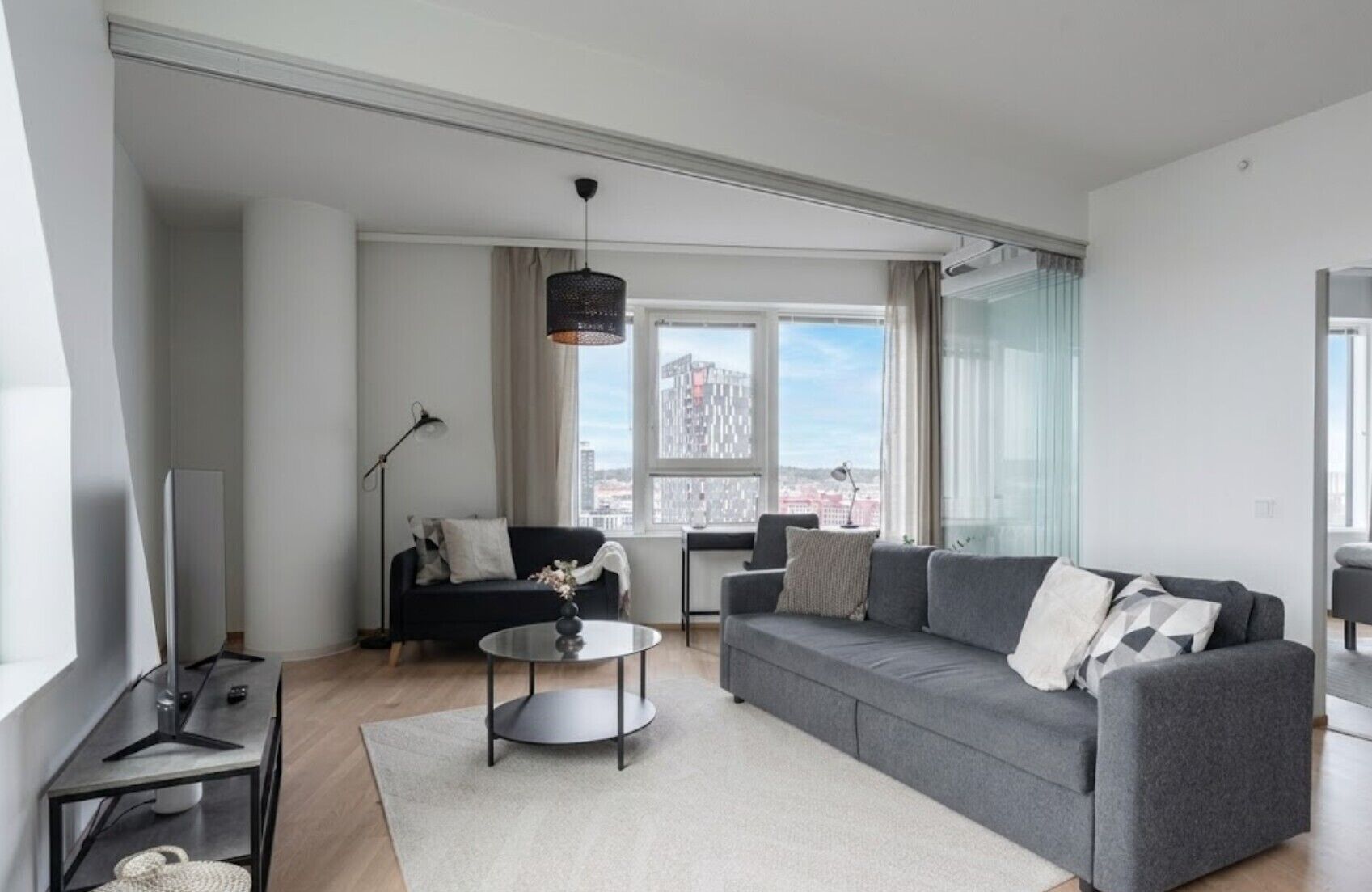 Exclusive Apartment | Living area | 40-inch flat-screen TV with cable channels, TV, heated floors