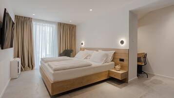 Ropa de cama de alta calidad, colchones con efecto memoria y minibar