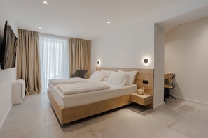 Habitación Deluxe, 1 cama de matrimonio grande | Ropa de cama de alta calidad, colchones viscoelásticos, minibar