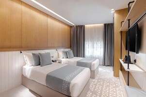 Classic Room, 2 Twin Beds | Down comforters, in-room safe, individually furnished, soundproofing