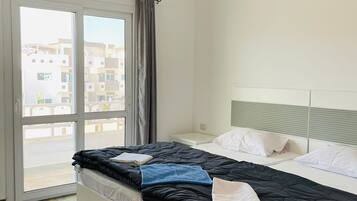 Elite Apartment | Egyptian cotton sheets, premium bedding, minibar, desk