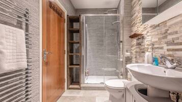 Bathtub, hair dryer, towels