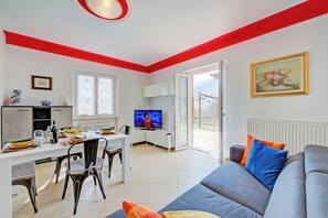 Family House, Multiple Bedrooms, Mountainside (Il Giardino In Montagna Family) | Living area | Flat-screen TV - Il Giardino In Montagna Family Friendly (Tenno)