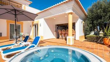 House, Multiple Beds | Outdoor spa tub
