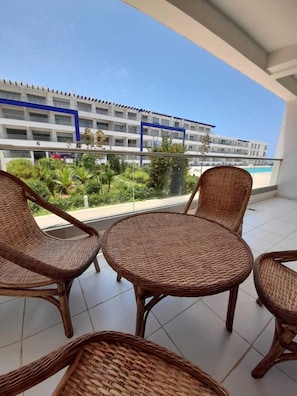 Apartment, 3 Bedrooms, Pool View | Garden view