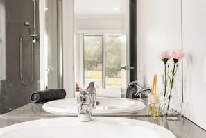 Bathtub, hair dryer, towels