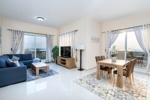 50-cm plasma TV with satellite channels - Luxury Sea View 1B Apartment in RAK (Ras Al Khaimah)