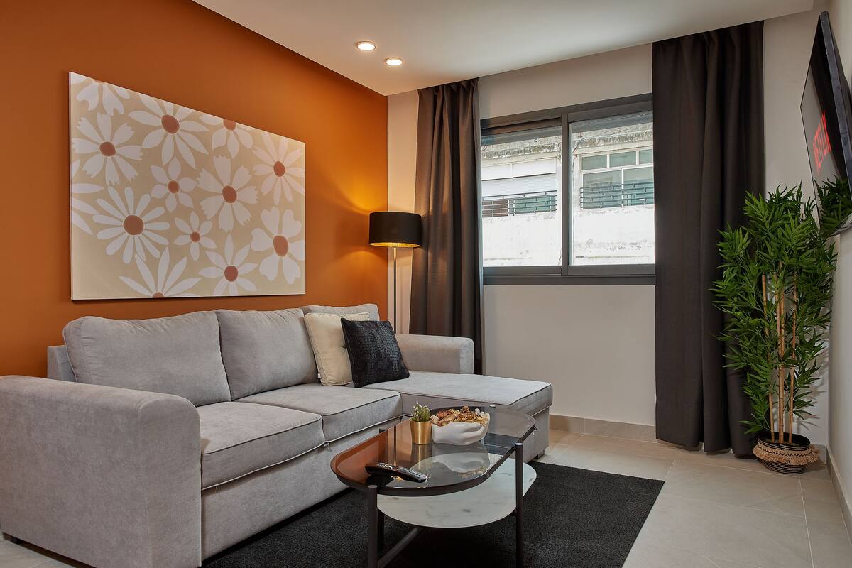 Deluxe Apartment | Living area | 45-inch Smart TV with satellite channels, TV