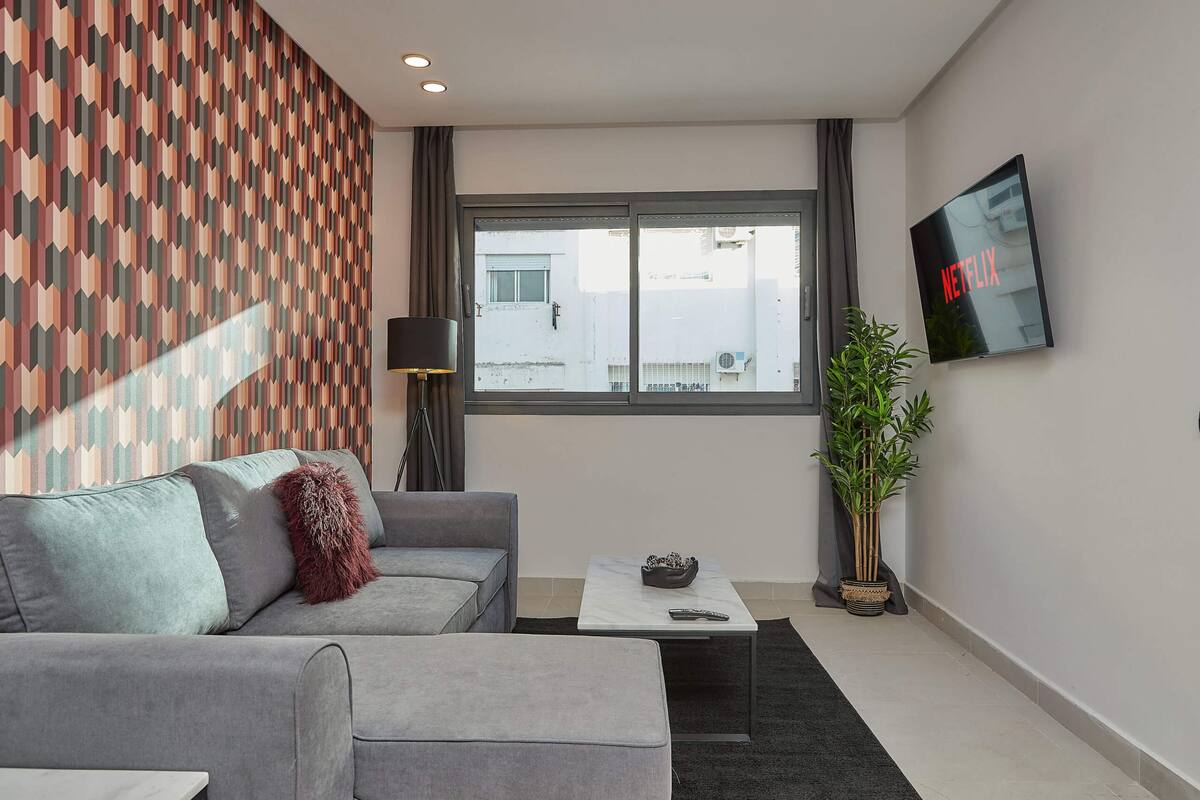 Comfort Apartment | Living area | 45-inch Smart TV with satellite channels, TV
