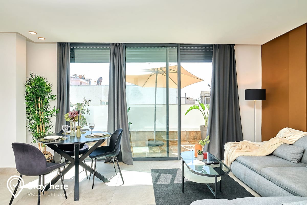 Royal Apartment | Living area | 45-inch Smart TV with satellite channels, TV