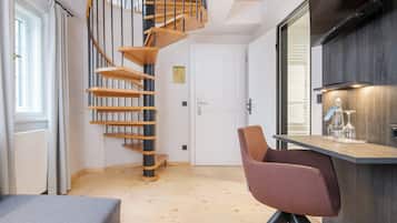 Gallery Duplex | Living area | Flat-screen TV, toys