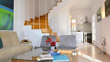 Standard Villa | Living area | Flat-screen TV, fireplace, streaming services