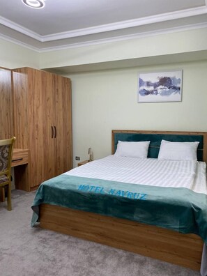 Singola Business | Area soggiorno | TV a schermo piatto