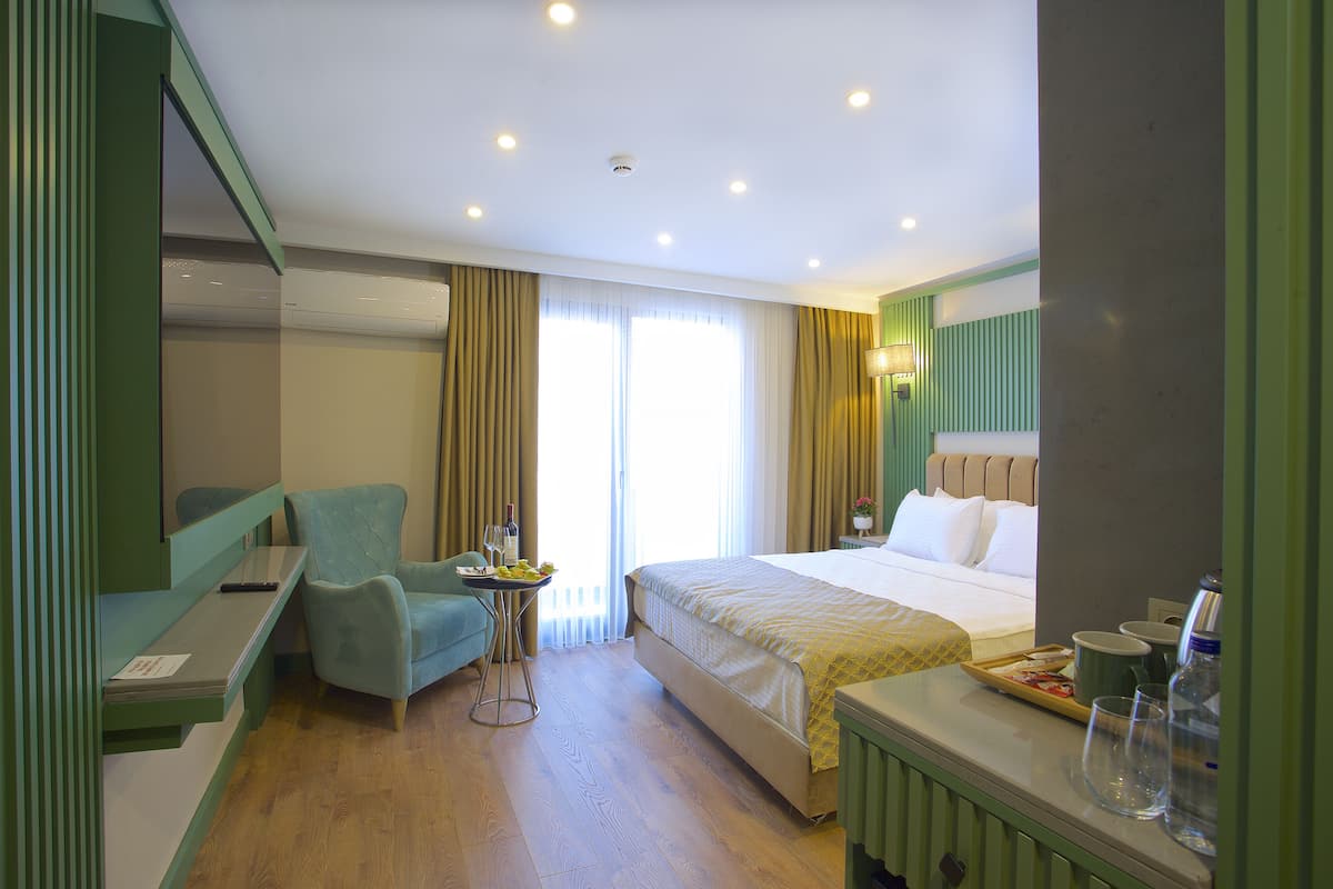 Habitación doble Deluxe | Ropa de cama de alta calidad, edredón y artículos del minibar gratis