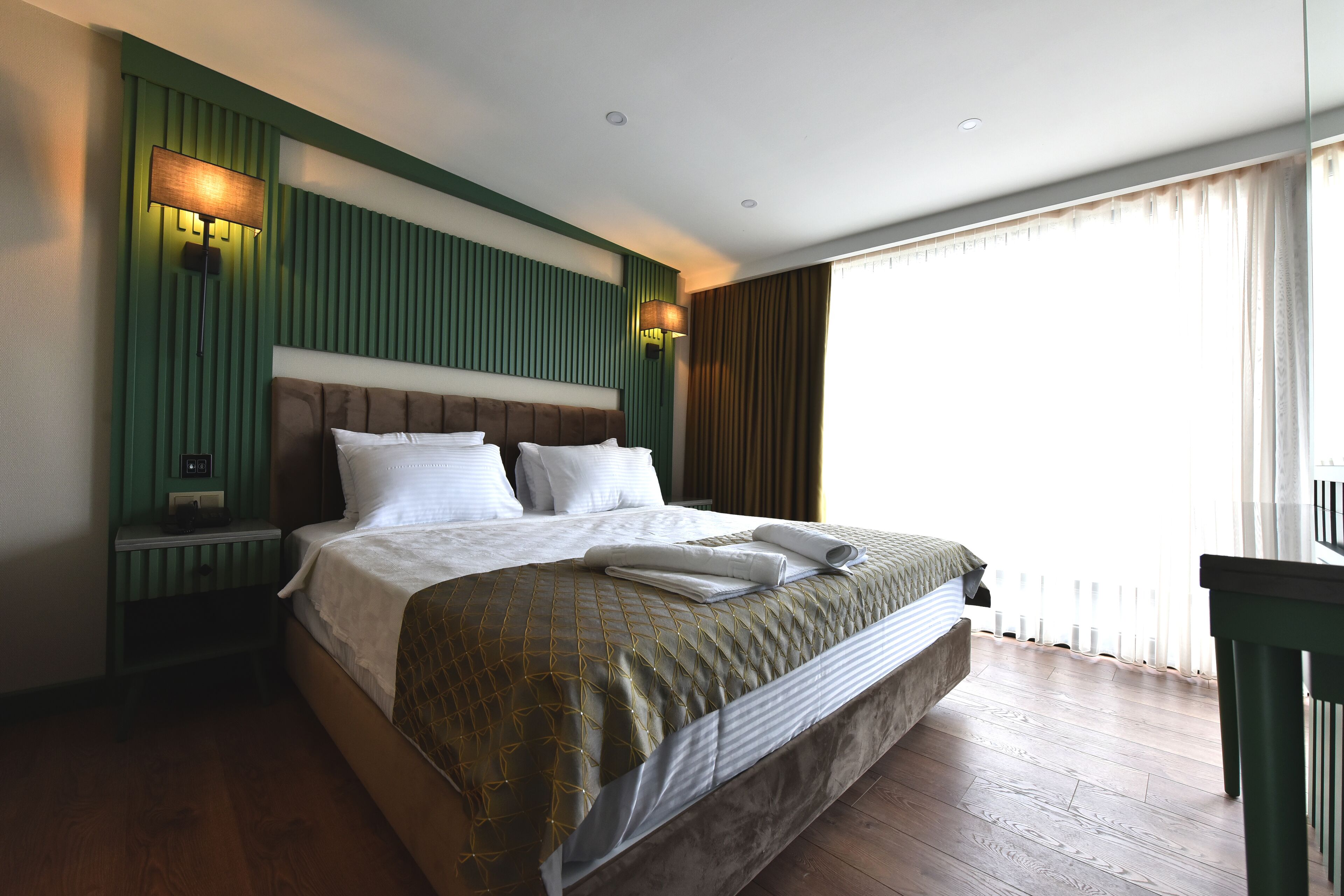 Studio Suite Mewah | Seprai premium, selimut bulu angsa, minibar gratis, dan brankas