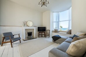 TV, fireplace, books, offices