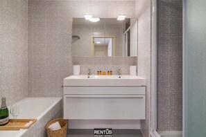 Bathtub, hair dryer, towels