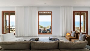 Signature Villa | Living area - Luxury Villa over the Cliffs by FeelHome (Hefer Valley)