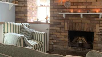 Fireplace, books, stereo