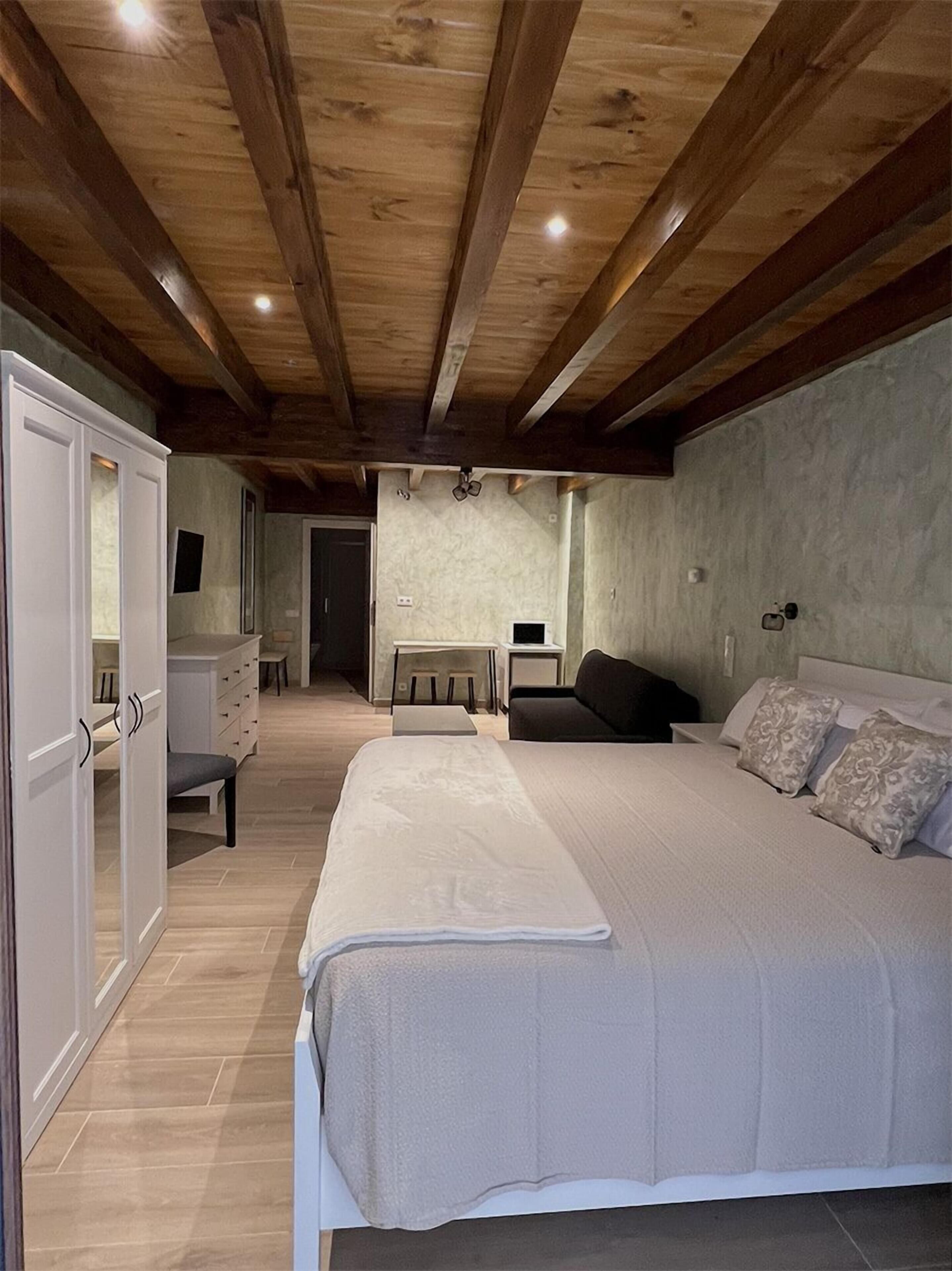 Premium bedding, down comforters, memory foam beds, minibar