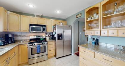 Dog-friendly home with upper/lower decks, fireplaces, grill, & great location