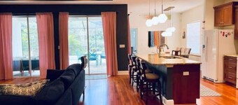 Cheerful 4 Bed, 3 Bath Home with Screened Pool