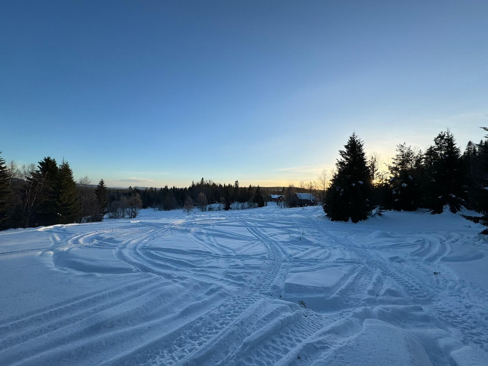 A snowy landscape with a clear sky.