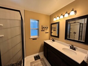 Shower, towels, soap, shampoo