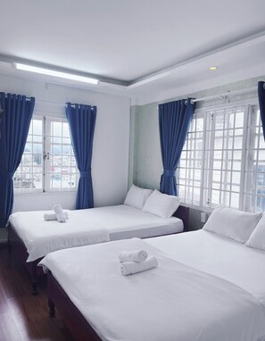 Standard Quadruple Room | Minibar, desk, laptop workspace, blackout curtains - Glory - Gia Huy Hotel (Da Lat)