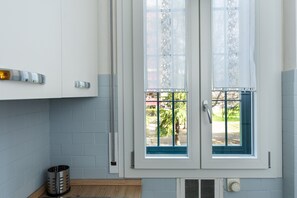 Apartment | Private kitchen | Full-size fridge, oven, stovetop, cookware/dishes/utensils - HouSmart Cimabue 1 (Bologna)