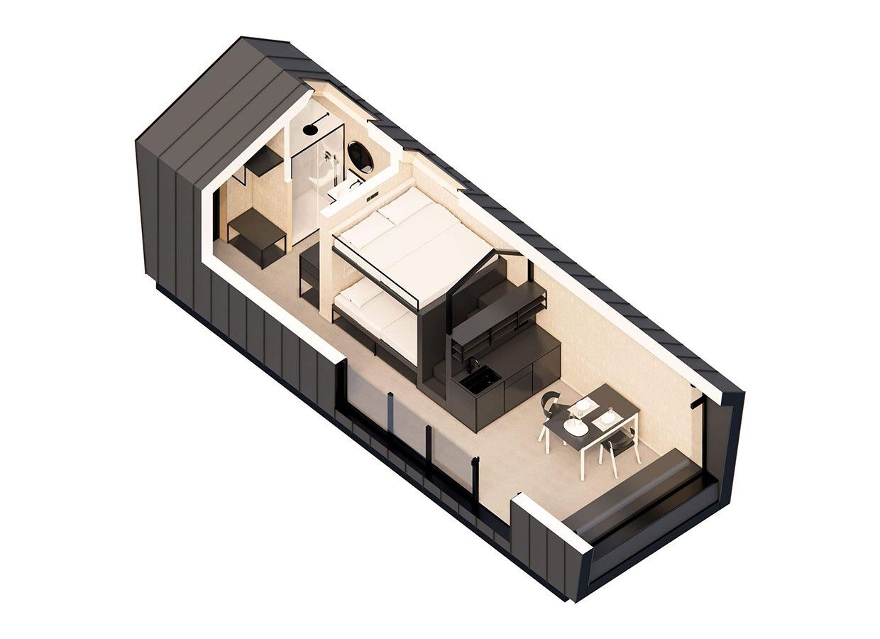 Un intérieur moderne comprenant un espace de vie central, une cuisine et une salle à manger séparée.