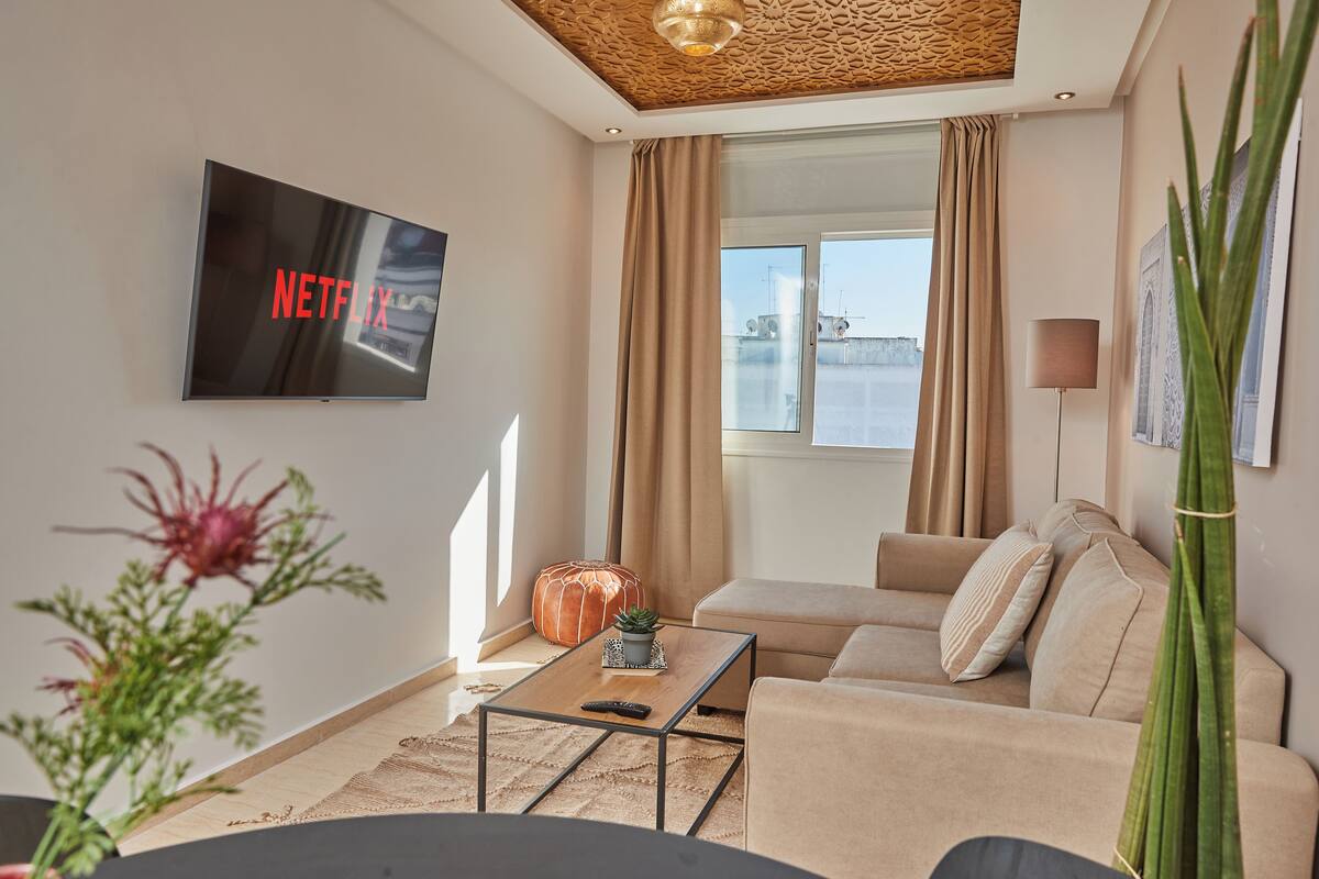 Standard Apartment | Living area | 45-inch Smart TV with satellite channels, TV, offices