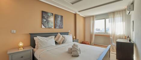 Apartamento família | Ferros/tábuas de passar roupa, Wi-Fi de cortesia, roupa de cama