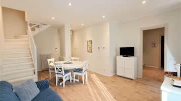 Apartment | Living area | 40-inch flat-screen TV with cable channels, TV