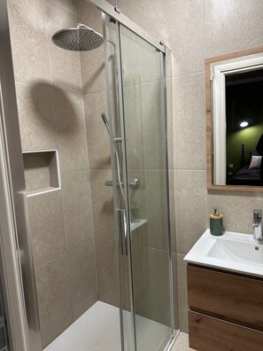 Shower, hair dryer, towels, soap