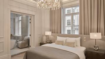 Roupas de cama premium, edredons de pluma, frigobar, cofres nos quartos