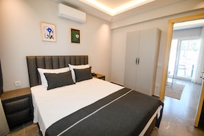 ห้องจูเนียร์สวีท | เครื่องนอนระดับพรีเมียม, มินิบาร์, ตู้นิรภัยในห้องพัก, ผ้าม่านกันแสง