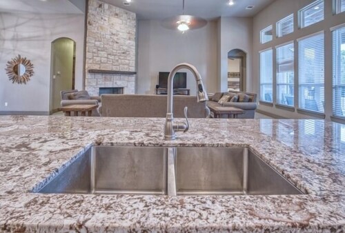 Beautiful and spacious home with a pool in the Heartstone Subdivision