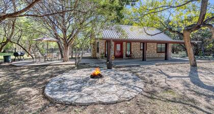 Smaller home in the Cypress Bend subdivision one block from the river.
