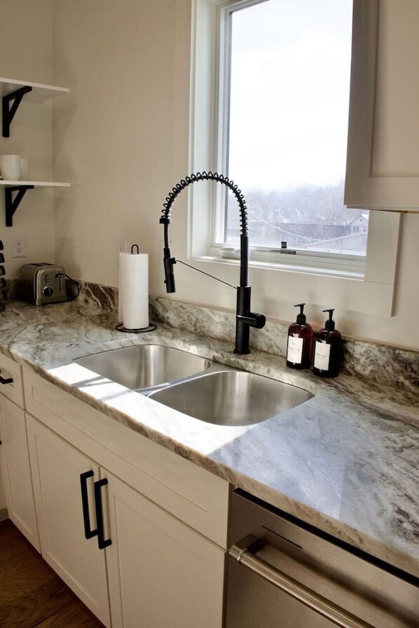 Fridge, stovetop, coffee/tea maker, cookware/dishes/utensils