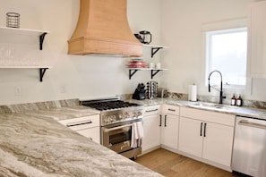 Fridge, stovetop, coffee/tea maker, cookware/dishes/utensils