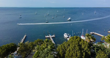 Tropical bayfront villa with sandy beach