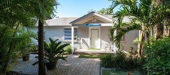 Tropical bayfront villa with sandy beach